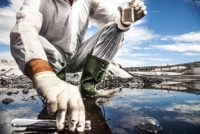 Scientist analyze the water of a river