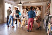Team standing during meeting