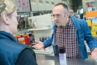 Angry customer arguing with cashier